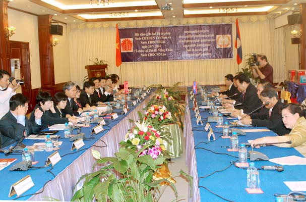 Bộ trưởng Bộ Tư pháp Hà Hùng Cường hội đàm với Bộ trưởng Tư pháp Lào